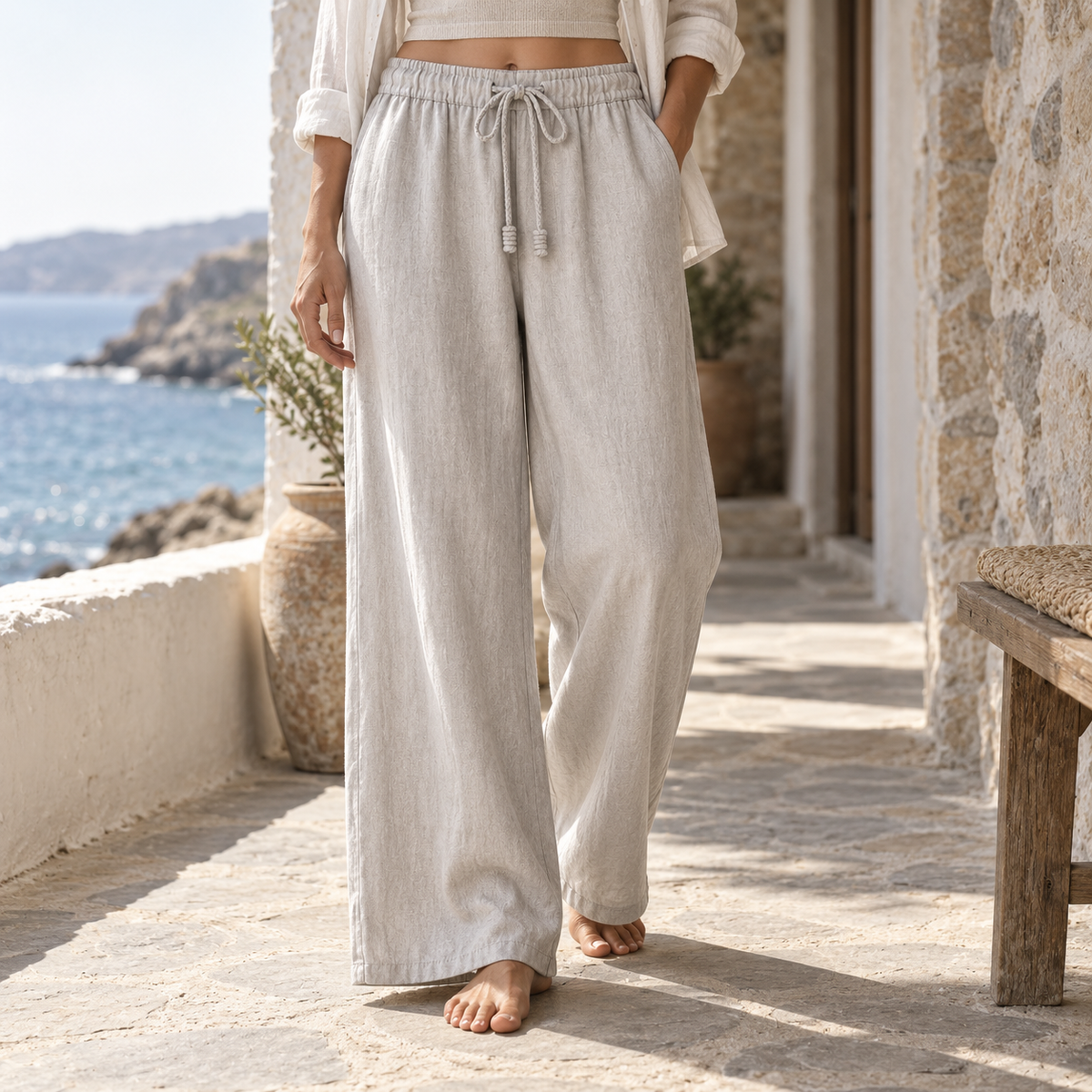 Mirelle Drift Drawstring Trouser worn in a coastal corridor